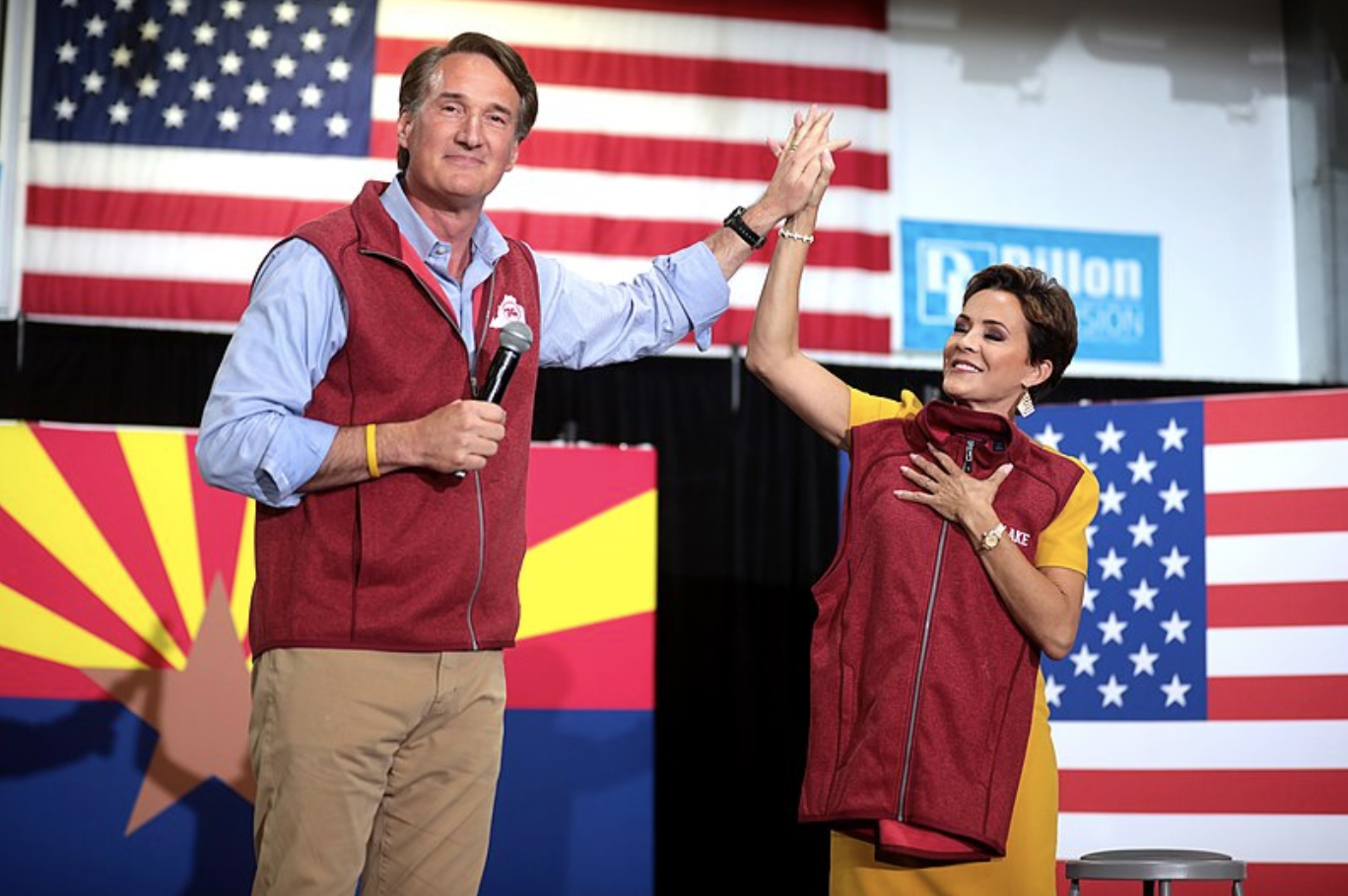 Glenn Youngkin is Running for Last Place —   https://commons.wikimedia.org/wiki/File:Glenn_Youngkin_%26_Kari_Lake_%2852442416066%29.jpg  